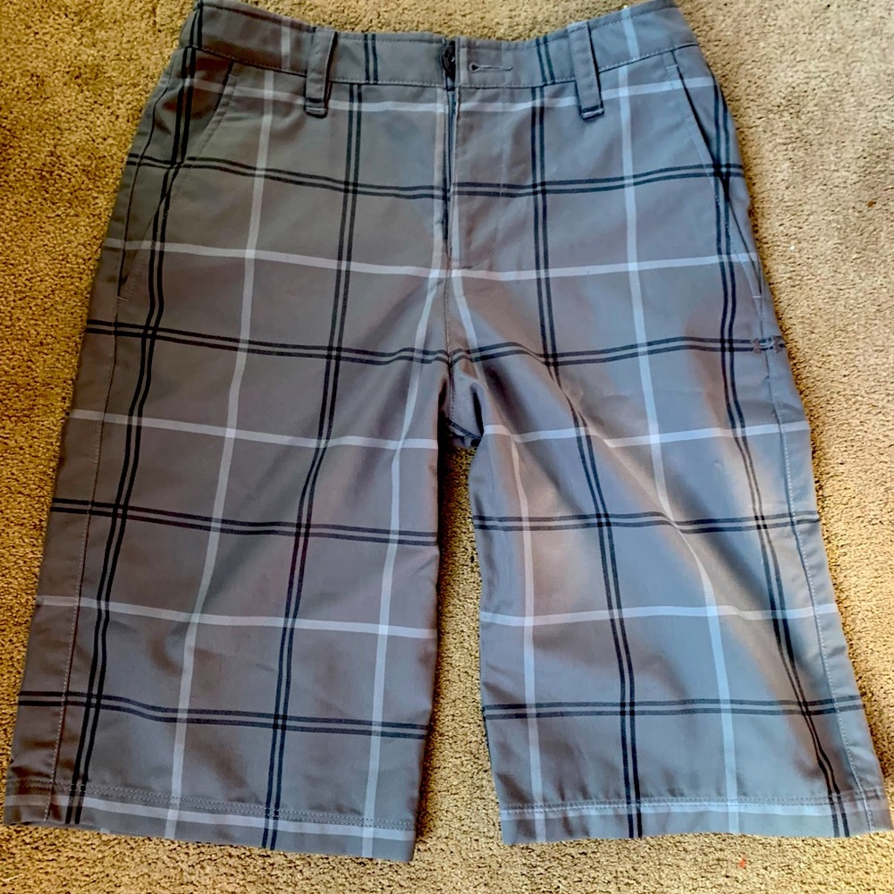 Grey and black platter shorts. Size- youth large. Under Armour